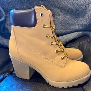 High heeled boots.